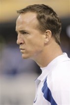 Indianapolis Colts quarterback Peyton Manning looks on as the Indianapolis Colts prepare for an NFL football game against the Pittsburgh Steelers in Indianapolis, Sunday, Sept. 25, 2011. Colts owner Jim Irsay says there is an "outside chance"  Manning might return in December. Irsay used Twitter on Monday, Sept. 26, 2011,  to update Colts fans on Manning's status after remarks he made during a private breakfast with Super Bowl donors. (AP Photo/AJ Mast)