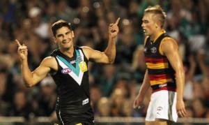 Teal or no teal, Port Adelaide's uniforms are wayyy better than rival Adelaide's tequila sunrise kit.