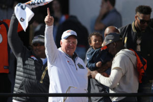 DENVER, CO - FEBRUARY 09:  Wade Phillips defensive coordinator of the Denver Broncos celebrates on the stage as the Super Bowl 50 Champion Denver Broncos are honored at a rally on the steps of the Denver City and County Building on February 9, 2016 in Denver, Colorado. The Broncos defeated the Carolina Panthers 24-10 in Super Bowl 50.  (Photo by Doug Pensinger/Getty Images)